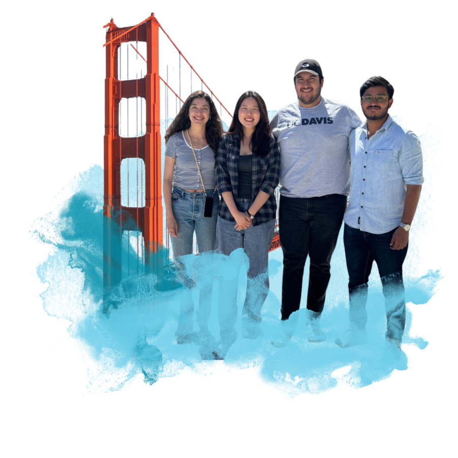 Four people standing in front of the Golden Gate bridge