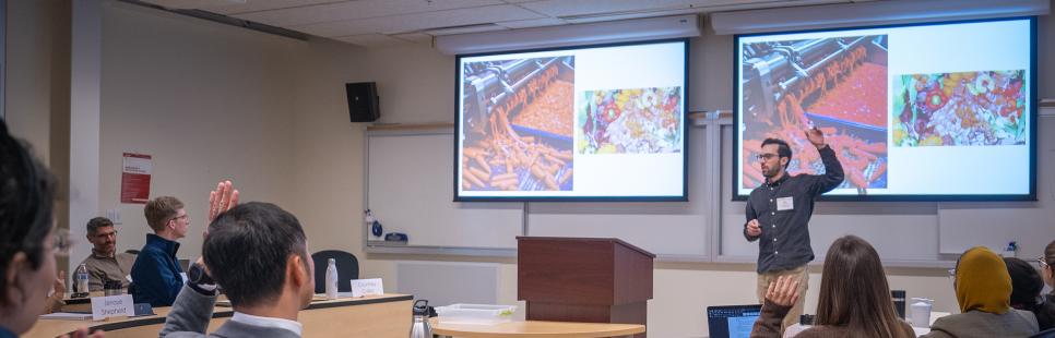 Dan Kurzrock talking to students in classroom