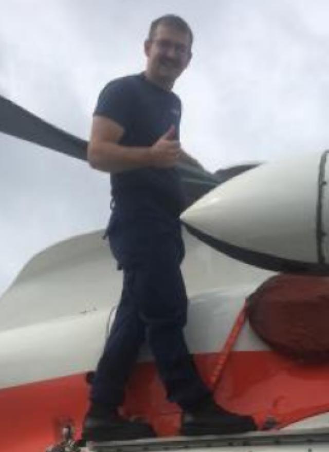 Nathan James on helicopter
