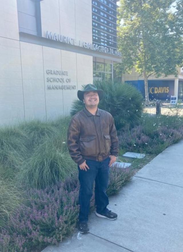 Michael Hui standing in front of Gallagher Hall