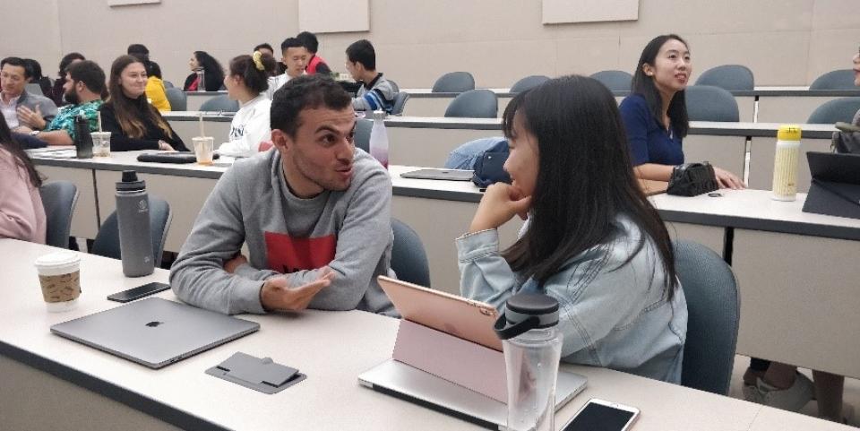 A pair of MBA students workin at the Berkeley Executive Coaching Institute workshop